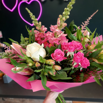 Sweetest Dreams - A gorgeous handtied in pink and white with complimentary foliage.