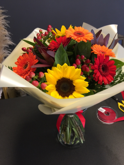 Sunshine Burst - A bright and joyful bouquet designed to bring warmth, happiness and a touch of sunshine to any occasion.