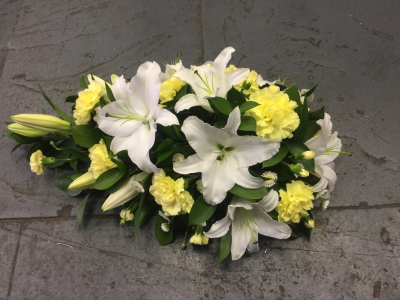 Peaceful Farewell Spray - A timeless sympathy tribute, carefully designed to honour a loved one with dignity and remembrance.